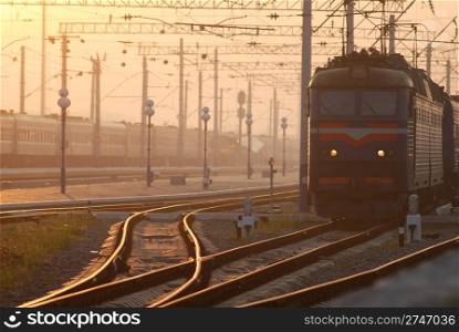 train on platform. Railroad. Sunrise