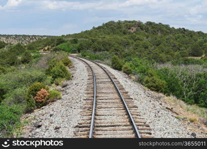 Train tracks curving along a mountain pass near La Veta, Colorado