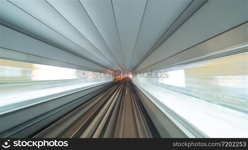 Train view. blurry speed motion on railway tunnel for futuristic network connection technology, digital data in computer concept. Abstract background at night time.