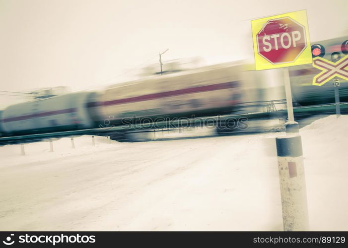 Train with oil tanks moving. Transportation of fuel on the railroad. Motion blur.. Train with oil tanks moving.