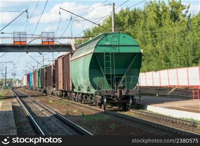 train with tank cars on the railroad tracks in the sky. freight tanks on railways