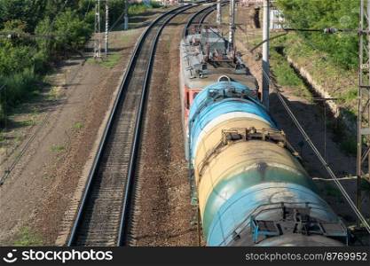 train with tank cars on the railroad tracks, top view. freight tanks on railways