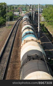 train with tank cars on the railroad tracks, top view. freight tanks on railways