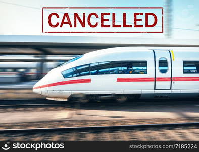 Trains cancelled due to pandemic of coronavirus. Passenger railway travel and transportation cancellation due to epidemic of Covid-19. Background with railway station, high speed train and text