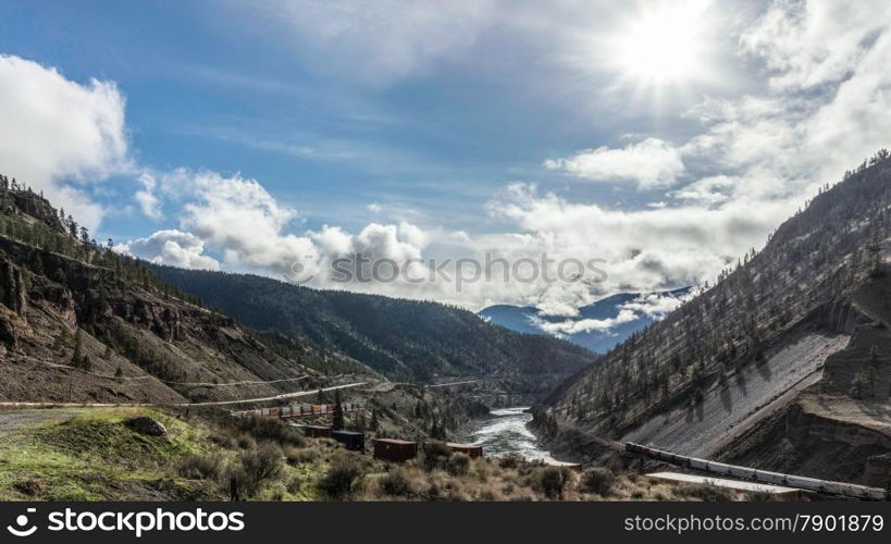 Trains on Both Sides of the River in the Fraser Canyon