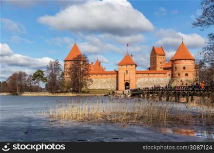 Trakai Island Castle orange walls and towers, lake Galve, Republic of Lithuania