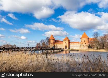 Trakai Island Castle orange walls and towers, lake Galve, Republic of Lithuania