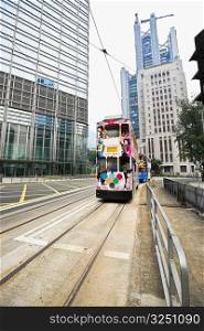 Trams moving on the track, Des Voeux Road, Hong Kong Island, China