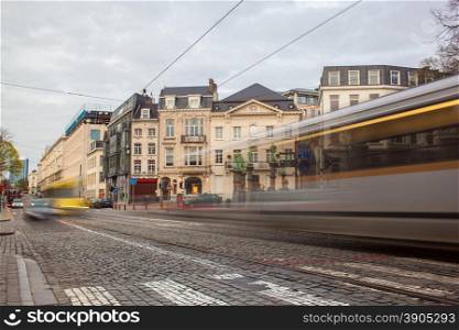 Tramway in motion on the street of Brussels near The Sablon Square