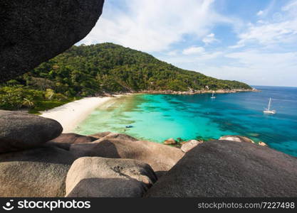 Tranquil scenery of Similan Islands on summer morning, wonderful view from stone mountain, bright and beautiful turquoise seawater, top tourist attractions in South Thailand.