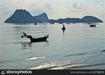 tranquil scenery of the bay of Prachuap Khiri Khan in the morning sun