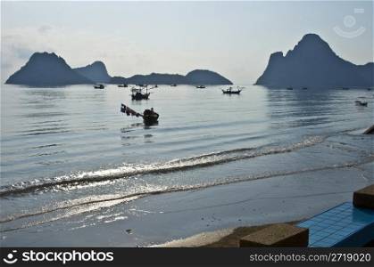 tranquil scenery of the bay of Prachuap Khiri Khan in the morning sun