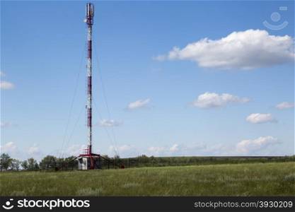 Transmitter LTE tower in sunny summer day. LTE and GSM tower in sunny summer day