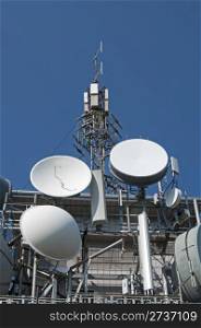 Transmitters, antennas and repeaters on building