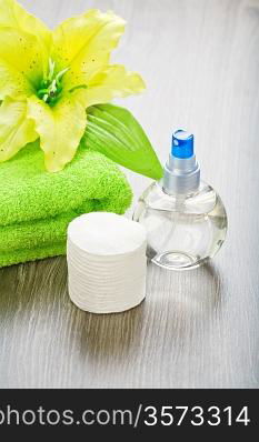 transparent bottle towel flower and cotton pads