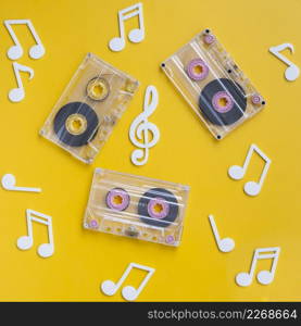 transparent cassette tapes collection with musical notes around