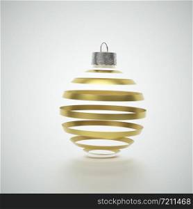 Transparent Christmas ball decoration with alternating gold stripes isolated on a grey studio background for holiday concepts