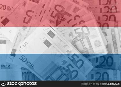 transparent dutch flag with euro banknotes