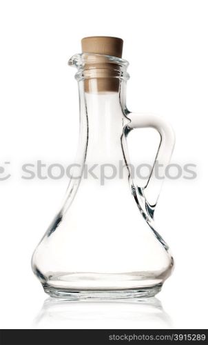 Transparent glass carafe with a cork isolated on white background