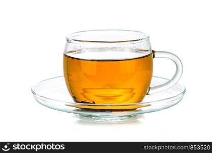 Transparent glass cup of tea isolated on a white background in close-up