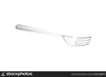 Transparent plastic fork isolated on white background. Close up