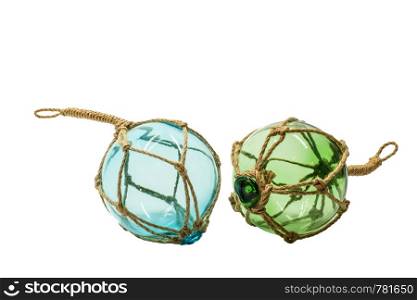 Transparent scandinavian decor blue and green glass sphere in ropes isolated on white background. Transparent scandinavian decor glass sphere in ropes isolated on white background