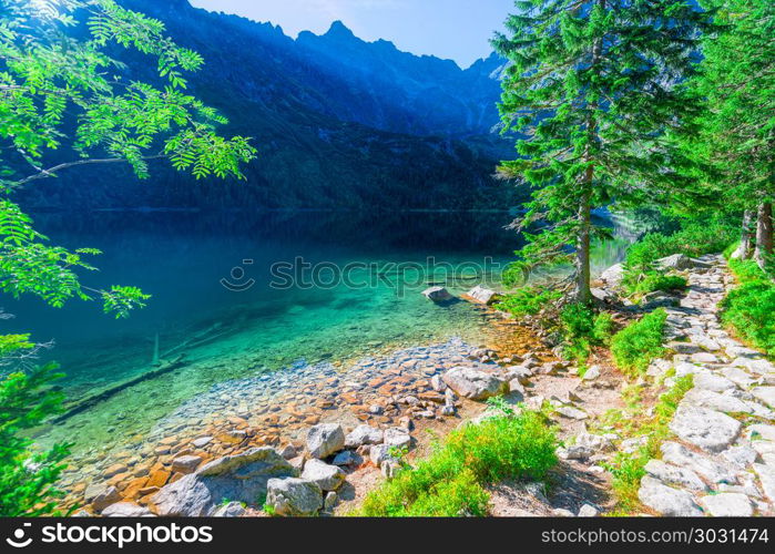 transparent turquoise water Sea Eye the lake in the Tatra Mounta. transparent turquoise water Sea Eye the lake in the Tatra Mountains, Poland,