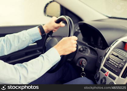 transport, business trip, destination and people concept - close up of young man driving car