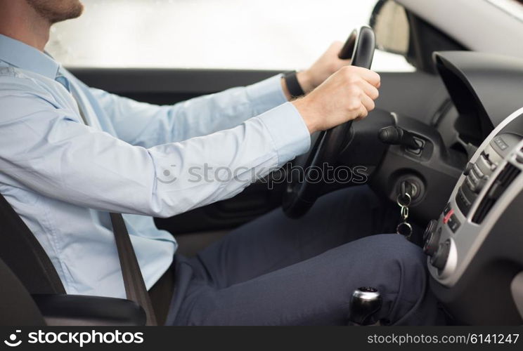 transport, business trip, destination and people concept - close up of young man driving car