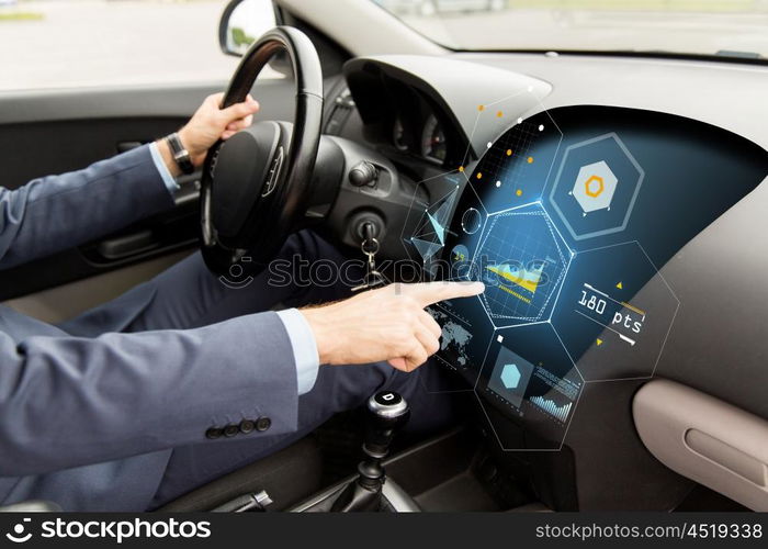 transport, business trip, modern technology and people concept - close up of man driving car and pointing finger to diagram on board computer screen