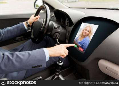 transport, business trip, modern technology, communication and people concept - close up of man driving car and receiving video call from woman on board computer screen