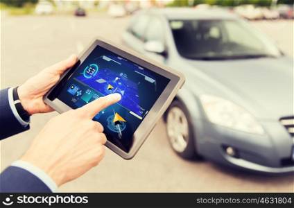 transport, business trip, navigation, technology and people concept - close up of male hands with navigator tablet pc computer and car outdoors