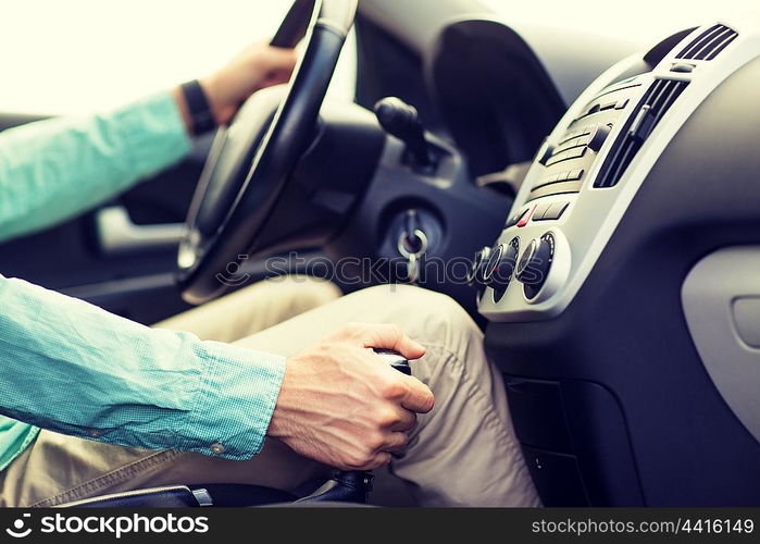 transport, business trip, speed, destination and people concept - close up of young man driving car