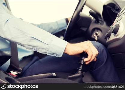 transport, business trip, speed, destination and people concept - close up of young man driving car