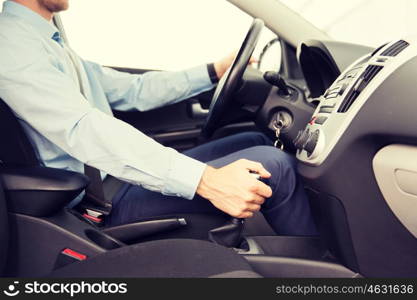 transport, business trip, speed, destination and people concept - close up of young man driving car