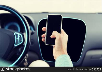 transport, business trip, technology and people concept - close up of male hand with smartphone driving car