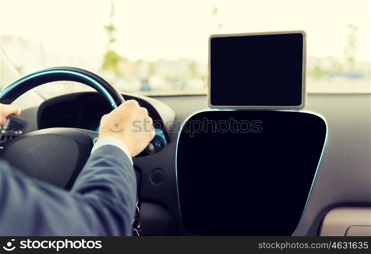 transport, business trip, technology, navigation and people concept - close up of businessman with black blank tablet pc and on board computer driving car