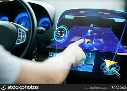 transport, destination, modern technology and people concept - male hand searching for route using navigation system on car dashboard screen