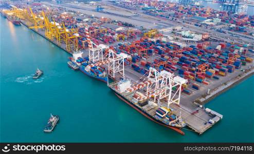 transport dock and container warehouse and shipping loading and unloading cargo containers import export international by the sea aerial view