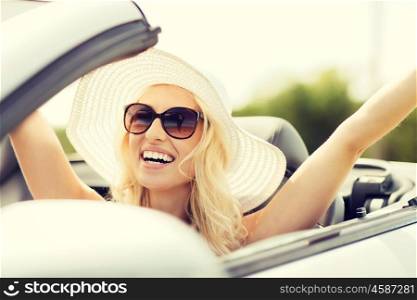 transport, leisure and people concept - face of happy woman in summer hat and sunglasses driving cabriolet car outdoors