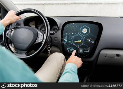 transport, modern technology and people concept - close up of man driving car and pointing finger to diagram on board computer screen