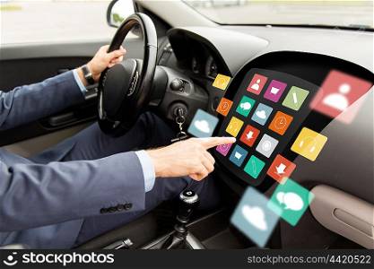 transport, modern technology, multimedia, business and people concept - close up of man driving car with menu icons on board computer screen