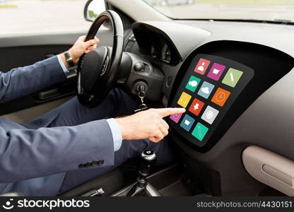 transport, modern technology, multimedia, business and people concept - close up of man driving car with menu icons on board computer screen