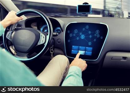 transport, road trip, technology, communication and people concept - close up of man driving car with network icons on board computer