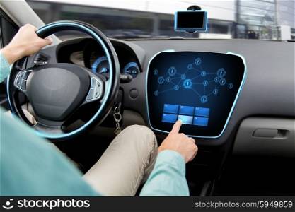 transport, road trip, technology, communication and people concept - close up of man driving car with network icons on board computer