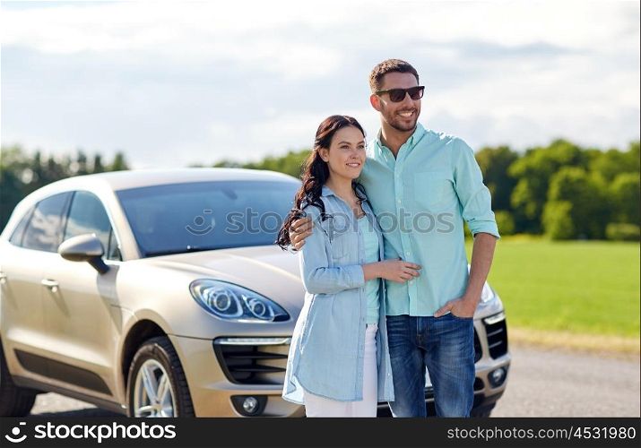 transport, road trip, travel, family and people concept - happy man and woman hugging at car