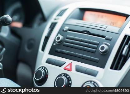 transport, technology and vehicle concept - close up of car dashboard or onboard computer