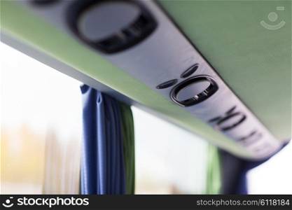 transport, tourism, road trip and equipment concept - close up of travel bus speakers