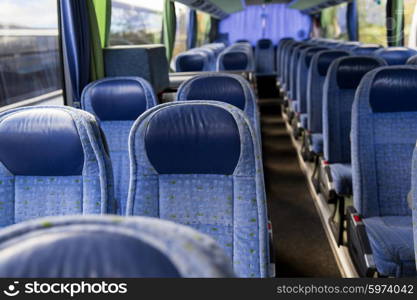 transport, tourism, road trip and equipment concept - travel bus interior