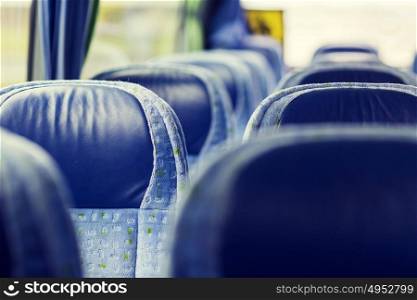 transport, tourism, road trip and equipment concept - travel bus interior and seats. travel bus interior and seats